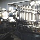 Used Pfaudler 28 Head Rotary Piston Filler.