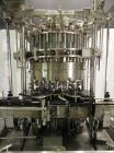 Used- Serac Model DT16C 16-Head Liquid Piston Filler