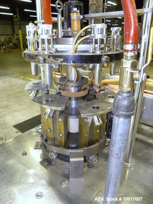 Used Biner Ellison 6 Head Rotary Liquid Positive Displacement Filler