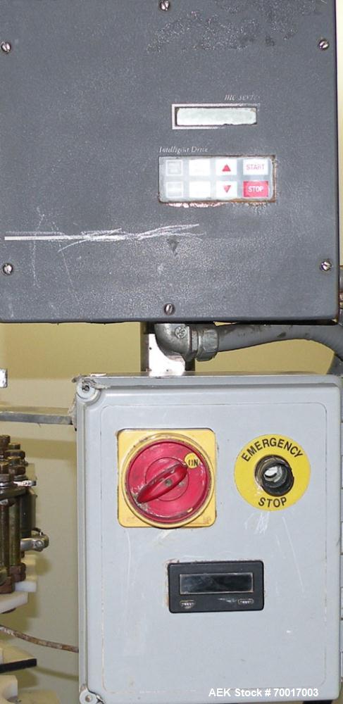 Used Biner Ellison Versamatic 12 Head Rotary Liquid Positive Displacement Filler, Model V 26-12. (12) 1/2" diameter nozzles on approximately 7" centers. Worm screw to starwheel infeed; left to right ...