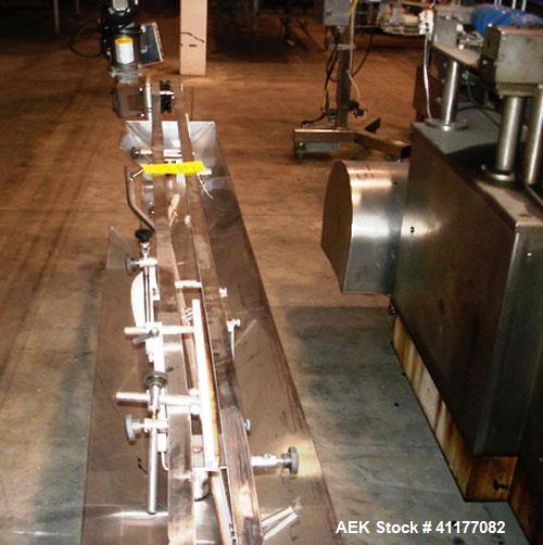 Used Kalish 6 Head Positive Displacement Filler, Model KT-6. Positive shut off valves. Last filling 1 oz and 2 oz containers. Currently set up with 12 liter per minute pumps. Has 10' long x 4-1/2" wi...