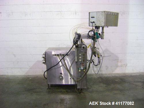 Used Kalish 6 Head Positive Displacement Filler, Model KT-6. Positive shut off valves. Last filling 1 oz and 2 oz containers. Currently set up with 12 liter per minute pumps. Has 10' long x 4-1/2" wi...