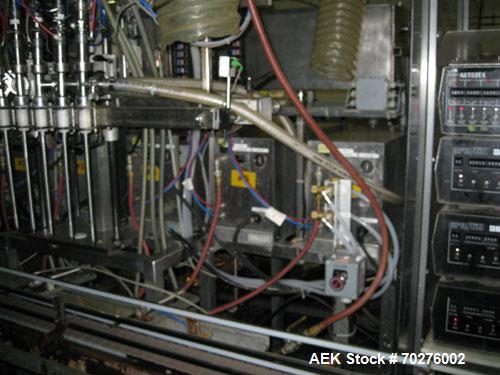 Used Oden Profil 1000 6-Head Inline Volumetric Filler. This unit features six (6) Waukesha Model 15 universal pumps and is currently set up with 1 inch diameter positive shut off nozzles. Pin Indexin...