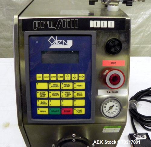 Used Oden Pro/Fill 1000 Benchtop Liquid Filler, Model PF1K. Applications include free flowing to low viscosity products. Now equipped with a stainless steel T-Pump for 0.9 gpm, pinch valve shut-off ,...