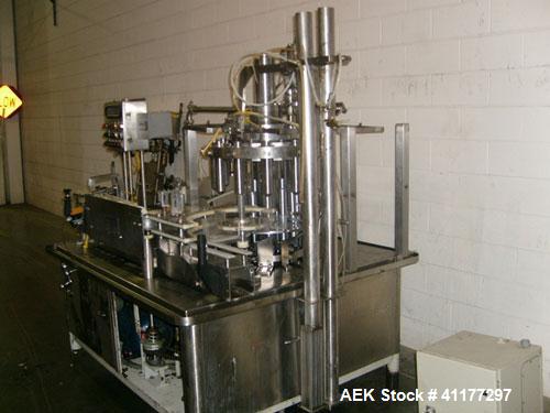 Used Pacific Packaging Machinery 12 Head Rotary Positive Displacement Filler. Capable of speeds up to 160 cpm. Has (12) 3/4" diameter nozzles on 6" centers. Rising pedestals for a bottom up fill. Has...