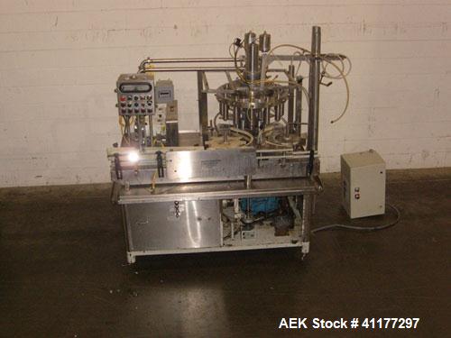 Used Pacific Packaging Machinery 12 Head Rotary Positive Displacement Filler. Capable of speeds up to 160 cpm. Has (12) 3/4" diameter nozzles on 6" centers. Rising pedestals for a bottom up fill. Has...