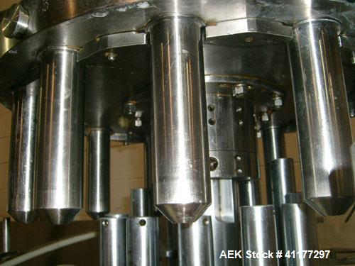 Used Pacific Packaging Machinery 12 Head Rotary Positive Displacement Filler. Capable of speeds up to 160 cpm. Has (12) 3/4" diameter nozzles on 6" centers. Rising pedestals for a bottom up fill. Has...