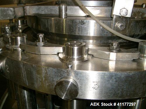 Used Pacific Packaging Machinery 12 Head Rotary Positive Displacement Filler. Capable of speeds up to 160 cpm. Has (12) 3/4" diameter nozzles on 6" centers. Rising pedestals for a bottom up fill. Has...