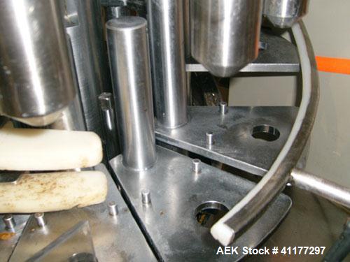 Used Pacific Packaging Machinery 12 Head Rotary Positive Displacement Filler. Capable of speeds up to 160 cpm. Has (12) 3/4" diameter nozzles on 6" centers. Rising pedestals for a bottom up fill. Has...