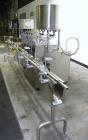 Used Kalish Kalishtronic Model KT12 Positive Displacement Filler. Currentlyt set up with 8 pumps and filling nozzles. Has neck guides, positive shut off nozzles, pin indexing and table top chain conv...