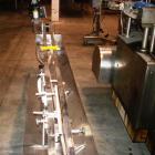 Used Kalish 6 Head Positive Displacement Filler, Model KT-6. Positive shut off valves. Last filling 1 oz and 2 oz containers. Currently set up with 12 liter per minute pumps. Has 10' long x 4-1/2