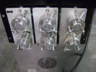 Used Kalish 6 Head Positive Displacement Filler, Model KT-6. Positive shut off valves. Last filling 1 oz and 2 oz containers. Currently set up with 12 liter per minute pumps. Has 10' long x 4-1/2