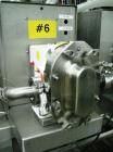 Used Oden Profil 1000 6-Head Inline Volumetric Filler. This unit features six (6) Waukesha Model 15 universal pumps and is currently set up with 1 inch diameter positive shut off nozzles. Pin Indexin...