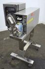 Used Oden Metering Filler,Semi Auto with foot pedal swicth. Model Pro Fill 5000, 2 Gallon Per Minute Capacity. Consisting of: (1) Waukesha rotary positive displacement pump, model 3DO, stainless stee...