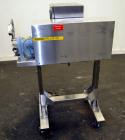 Used Oden Metering Filler,Semi Auto with foot pedal swicth. Model Pro Fill 5000, 2 Gallon Per Minute Capacity. Consisting of: (1) Waukesha rotary positive displacement pump, model 3DO, stainless stee...
