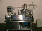 Used Pacific Packaging Machinery 12 Head Rotary Positive Displacement Filler. Capable of speeds up to 160 cpm. Has (12) 3/4