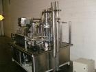 Used Pacific Packaging Machinery 12 Head Rotary Positive Displacement Filler. Capable of speeds up to 160 cpm. Has (12) 3/4