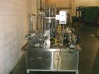 Used Pacific Packaging Machinery 12 Head Rotary Positive Displacement Filler. Capable of speeds up to 160 cpm. Has (12) 3/4