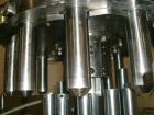 Used Pacific Packaging Machinery 12 Head Rotary Positive Displacement Filler. Capable of speeds up to 160 cpm. Has (12) 3/4