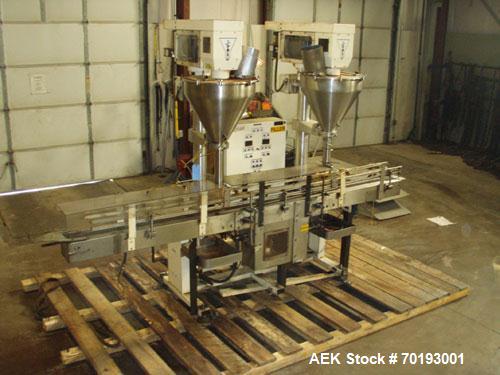Used AMS Model A-500E Dual Head Auger Filler. Machine has 2 A-100 with agitated hoppers, can handle free flowing and non-free flowing dry and liquid products. Machine has a stainless steel top and an...