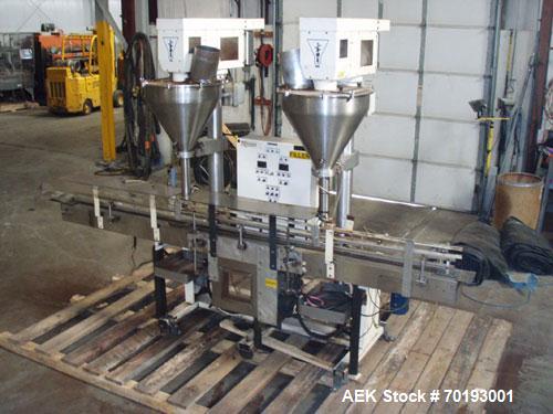 Used AMS Model A-500E Dual Head Auger Filler. Machine has 2 A-100 with agitated hoppers, can handle free flowing and non-free flowing dry and liquid products. Machine has a stainless steel top and an...