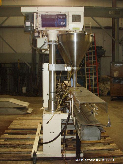Used AMS Model A-500E Dual Head Auger Filler. Machine has 2 A-100 with agitated hoppers, can handle free flowing and non-free flowing dry and liquid products. Machine has a stainless steel top and an...