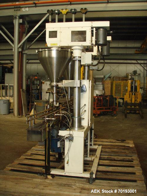 Used AMS Model A-500E Dual Head Auger Filler. Machine has 2 A-100 with agitated hoppers, can handle free flowing and non-free flowing dry and liquid products. Machine has a stainless steel top and an...