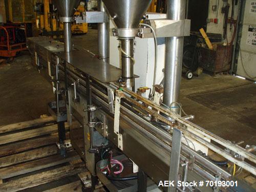 Used AMS Model A-500E Dual Head Auger Filler. Machine has 2 A-100 with agitated hoppers, can handle free flowing and non-free flowing dry and liquid products. Machine has a stainless steel top and an...