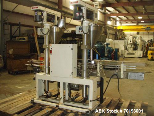 Used AMS Model A-500E Dual Head Auger Filler. Machine has 2 A-100 with agitated hoppers, can handle free flowing and non-free flowing dry and liquid products. Machine has a stainless steel top and an...
