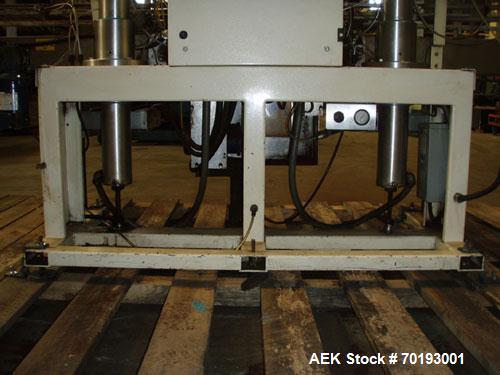 Used AMS Model A-500E Dual Head Auger Filler. Machine has 2 A-100 with agitated hoppers, can handle free flowing and non-free flowing dry and liquid products. Machine has a stainless steel top and an...