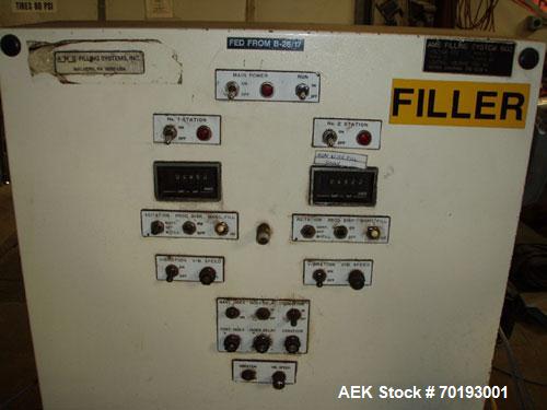 Used AMS Model A-500E Dual Head Auger Filler. Machine has 2 A-100 with agitated hoppers, can handle free flowing and non-free flowing dry and liquid products. Machine has a stainless steel top and an...