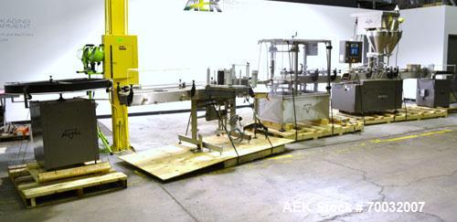 Used All-Fill Dual Head Automatic Container / Tub Filling Line. Line consists of: 48" diameter unscrambling feed disc, All Fill model DHA dual head auger filler with 10 gallon (38 liter) agitated hop...