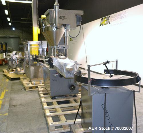 Used All-Fill Dual Head Automatic Container / Tub Filling Line. Line consists of: 48" diameter unscrambling feed disc, All Fill model DHA dual head auger filler with 10 gallon (38 liter) agitated hop...