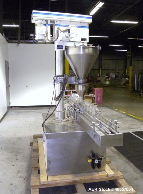 Used Mateer-Burt 3900 Series Automatic Auger Filler, Model 3919. Capable of speeds up to 90 containers per minute, depending on product. Has pin indexing system, bottom up fill and a stainless steel ...