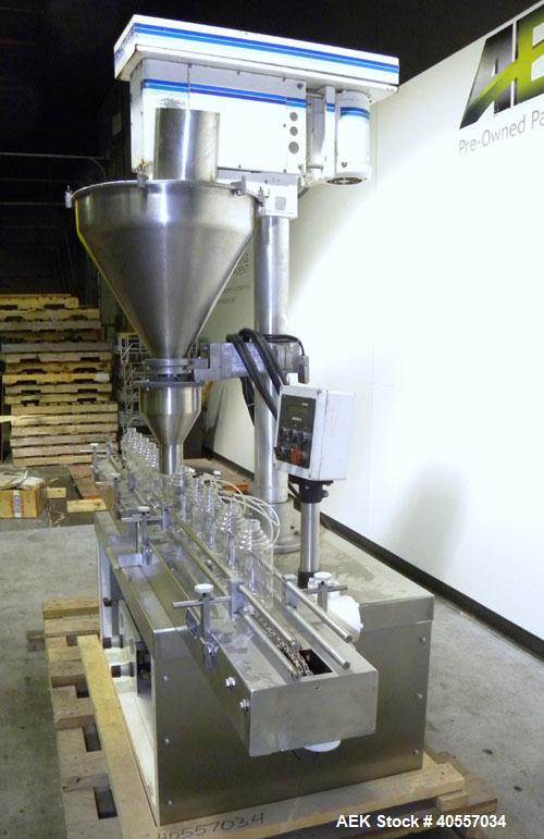 Used Mateer-Burt 3900 Series Automatic Auger Filler, Model 3919. Capable of speeds up to 90 containers per minute, depending on product. Has pin indexing system, bottom up fill and a stainless steel ...