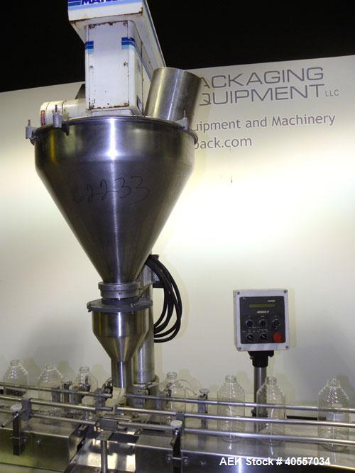 Used Mateer-Burt 3900 Series Automatic Auger Filler, Model 3919. Capable of speeds up to 90 containers per minute, depending on product. Has pin indexing system, bottom up fill and a stainless steel ...