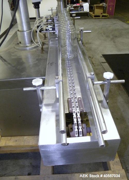 Used Mateer-Burt 3900 Series Automatic Auger Filler, Model 3919. Capable of speeds up to 90 containers per minute, depending on product. Has pin indexing system, bottom up fill and a stainless steel ...