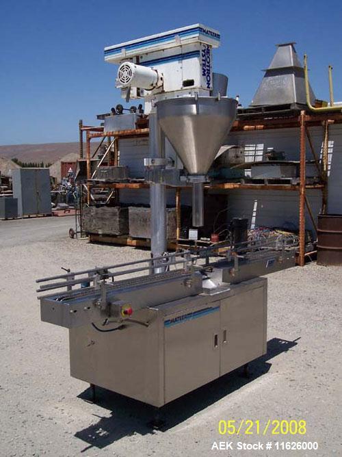 Used- Mateer 3920 Single Head Inline Auger Filler. Unit has Microset controls, stainless steel construction and 2-1/2" diame...