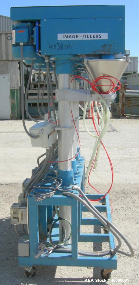 Used Image 4000 Quad Four Head Inline Auger Filling System. Each fillerhas a 22" diameter, 16 gallon, stainless steel agitated hopper. Has 6" diameter charge port on stainless steel cover with inspec...