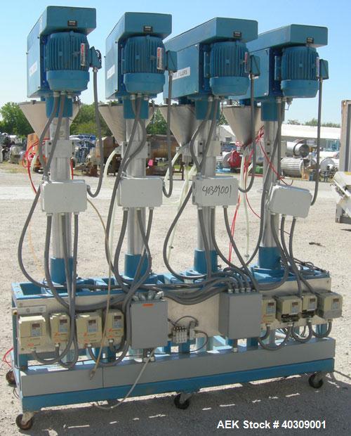 Used Image 4000 Quad Four Head Inline Auger Filling System. Each fillerhas a 22" diameter, 16 gallon, stainless steel agitated hopper. Has 6" diameter charge port on stainless steel cover with inspec...