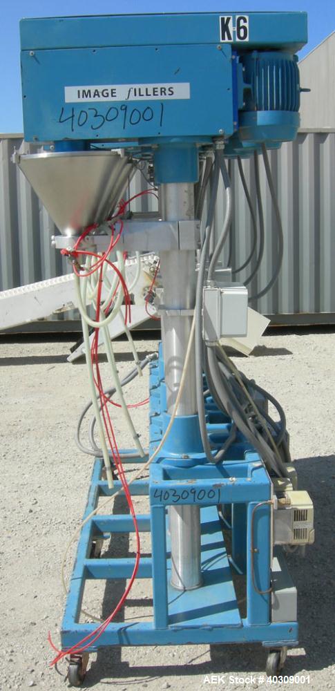 Used Image 4000 Quad Four Head Inline Auger Filling System. Each fillerhas a 22" diameter, 16 gallon, stainless steel agitated hopper. Has 6" diameter charge port on stainless steel cover with inspec...