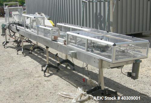 Used Image 4000 Quad Four Head Inline Auger Filling System. Each fillerhas a 22" diameter, 16 gallon, stainless steel agitated hopper. Has 6" diameter charge port on stainless steel cover with inspec...