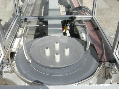 Used Image 4000 Quad Four Head Inline Auger Filling System. Each fillerhas a 22" diameter, 16 gallon, stainless steel agitated hopper. Has 6" diameter charge port on stainless steel cover with inspec...