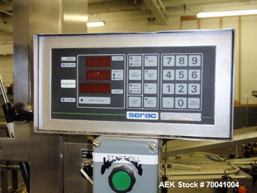 Used Serac Semi Automatic Single Head Filler, Model P1/2229 NW, Stainless Steel. Rated up to 500 containers per hour. Size range from 100 g to 11 kg packages. Height of containers usable under nozzle...
