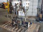 Used AMS Model A-500E Dual Head Auger Filler. Machine has 2 A-100 with agitated hoppers, can handle free flowing and non-free flowing dry and liquid products. Machine has a stainless steel top and an...