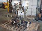 Used-AMS Model A-500E Dual Head Auger Filler. Machine has 2 A-100 with agitated hoppers, can handle free flowing and non-fre...