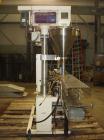 Used AMS Model A-500E Dual Head Auger Filler. Machine has 2 A-100 with agitated hoppers, can handle free flowing and non-free flowing dry and liquid products. Machine has a stainless steel top and an...