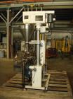 Used-AMS Model A-500E Dual Head Auger Filler. Machine has 2 A-100 with agitated hoppers, can handle free flowing and non-fre...