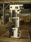 Used AMS Model A-500E Dual Head Auger Filler. Machine has 2 A-100 with agitated hoppers, can handle free flowing and non-free flowing dry and liquid products. Machine has a stainless steel top and an...