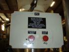 Used AMS Model A-500E Dual Head Auger Filler. Machine has 2 A-100 with agitated hoppers, can handle free flowing and non-free flowing dry and liquid products. Machine has a stainless steel top and an...